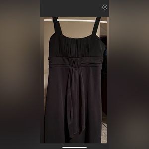 Roxette little black pretty dress with stylish front.